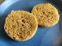 two pieces of bread sitting on top of a blue plate