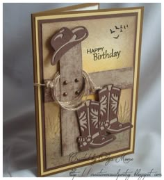 a birthday card with cowboy boots on it