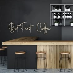 an empty bar with stools in front of it and the words eat drink enjoy written on the wall