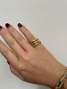 Tiffany & Co Schlumberger 18k gold wrap ring with two rubies. DESIGNER: Tiffany & Co MATERIAL: 18k Yellow Gold GEMSTONES: Ruby DIMENSIONS: Ring size 4.75, top is 14mm wide. MARKED/TESTED: Tiffany & Co, 18k, Schlumberger. WEIGHT: 22 grams CONDITION: Previously Owned / Excellent Condition Gold Open Sapphire Ring With Polished Finish, Modern Gold Ruby Ring For Anniversary, Modern Gold Ruby Ring, Modern Gold Ruby Ring With Polished Finish, Gold Open Ruby Ring, Gold Ruby Open Ring, Gold Open Ruby Ring In 14k, 14k Gold Ruby Open Ring, Gold Ruby Ring With Open Design