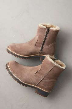 Cozy and classic, the cold-weather-ready Calib boots are a dream when the temps start to drop. Made of waterproof suede leather, these beautiful ankle boots protect you nicely from the elements, boasting plush shearling lining along the shaft and naturally insulating, breathable Merino wool lining at the foot. Pull them on or use the full inner zip—either way, you'll be immersed in softness and prepared for the first frost. With memory foam insoles and rubber lug outsoles. This boot has a genero Wool Boots, Comfortable Boots For Women, Fall Season Shearling Waterproof Boots With Round Toe, Womens Winter Boots, Women’s Winter Boots, Sheep Skin Boots, Shearling Boots With Leather Lining For Winter, Shearling Waterproof Boots For Winter Outdoors, Womens Fur Lined Boots