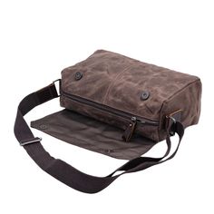 Waxed Canvas Messenger Bag Vintage Casual Canvas Crossbody Shoulder Bag For Outdoor Activities, Canvas Crossbody Shoulder Bag For Outdoor, Rectangular Canvas Bag With Leather Handles For Outdoor, Rectangular Outdoor Canvas Bag With Leather Handles, Outdoor Rectangular Canvas Bag With Leather Handles, Canvas Shoulder Bag With Waxed Finish For Outdoor, Canvas Shoulder Bag Satchel For Outdoor Activities, Rugged Shoulder Bag With Canvas Lining For Travel, Large Capacity Leather Canvas Bag For Outdoor