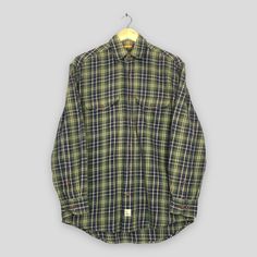 Vintage Timberland Green Checkered Flannel Shirt Medium Timberland Outdoor Buttondown Shirt Timberland Heavyweight Flannel Work Shirt Size M Good Used Condition. No holes and stains. Size (On Tag) : Size XS but fit like Size M **To make sure if it FITS YOU, refer at the exact measurements. Size Measurement (All measurements were taken lying flat) : Width [armpit to armpit] : 22 inches / 56 cm Length [shoulder to end of garment] : 30.5 inches / 77 cm THIS IS USED CLOTHING! PLEASE DON`T EXPECTED I Green Cotton Flannel Shirt For Work, Green Snap Button Shirt For Fall, Vintage Cotton Flannel Shirt For Workwear, Green Collared Classic Flannel Shirt, Classic Green Collared Flannel Shirt, Green Cotton Flannel Workwear Shirt, Green Cotton Flannel Shirt With Button Closure, Green Collared Cotton Flannel Shirt, Green Button-up Flannel Shirt