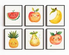 four watermelon, banana, and apple prints are hanging on the wall