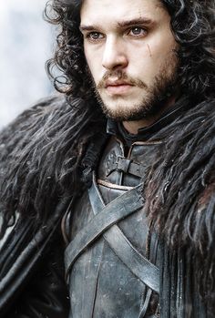 jon snow is looking at the camera