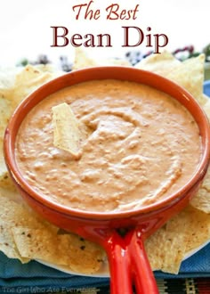 the best bean dip in a bowl with tortilla chips