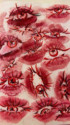 a drawing with red and black ink on white paper, depicting an eyeball pattern