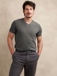 This classic v-neck t-shirt is cut from our Luxury-Touch cotton jersey—beloved for its signature softness and a smooth finish that leans more dressed-up in appearance.  V-neck.  Straight hem with vented sides.  Standard fit.  Short sleeves.  Hits at the hip.  Model: Size M, 6'2" (188cm). V Neck Tshirt, Business Casual Men, Fashion Story, Big And Tall, Curator Style, Charcoal Gray, Daily Fashion, Charcoal Grey, Black And Navy