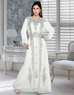 Mashallah! ❤️ Effective Embroidered Full Length Kaftan Dress-White Shop Now : https://bit.ly/3s7MvSP Buy online @ $252.95 #elegantkaftandresses #fancycaftan #fancycaftans #fancykaftan #imagesofkaftan #kaftandesign #kaftandesigns #kaftandressesdubai #kaftanstylemaxidresses #kaftansdesigns #kaptanclothes #khaftandress #ladieskaftandresses #longkaftandresses #kaftanegyptian #kaftansuits #womenkaftans #kaftandresswomen #arabkaftan #arabapparel Dress Modern Elegant, Green Kaftan, Amazing Embroidery, Long Length Dresses, Royal Wedding Dress, Moroccan Kaftan, Moroccan Wedding, Moroccan Caftan, Arab Fashion