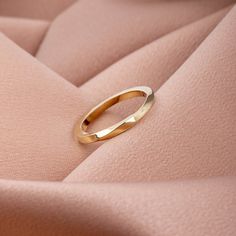 Twisted Wedding Band Ring for Women 14K Solid Gold Mobius - Minimalist Stacking Gold Ring A handmade wedding ring of 14k solid gold with softened edges for comfort. Engrave the ring with no extra cost. 100% handcrafted with love! D E T A I L S ● Metal: 14K solid gold, 14K white gold, 14K rose gold ● Dimensions: measures 2.1 mm in width x 2.2mm thick R I N G ∙ S I Z I N G For General Reference: ● we use standard US Ring Sizing ● an average women's ring finger is size 6-7 and an average men's ring Elegant Diamond Cut Rings In Recycled Gold, Formal Yellow Gold Stackable Rings In Recycled Gold, Minimalist Formal Ring With Halo Detail, Yellow Gold Infinity Rings For Formal Occasions, Minimalist Shiny Finish Rings For Anniversary, Minimalist Rings With Shiny Finish For Anniversary, Elegant Recycled Gold Bands For Anniversary, Elegant Recycled Gold Band As Gift, Yellow Gold Wedding Bands With A Modern Twist