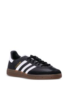 Find ADIDAS Handball Spezial Lace-up Trainers on Editorialist. black/white calf leather suede panelling logo print to the side logo patch at the tongue side stripe detailing front lace-up fastening branded insole rubber sole Classic Adidas Leather High-top Sneakers, Adidas Leather Skate Shoes With Three Stripes, High-top Leather Skate Shoes With Three Stripes Branding, Leather Sneakers With Three Stripes For Streetwear, Black Suede Adidas Sneakers, Black Suede Skate Shoes With Boost Midsole, Adidas Leather Skate Shoes With Logo, Black Adidas Leather Skate Shoes, Black Adidas Logo Leather Skate Shoes