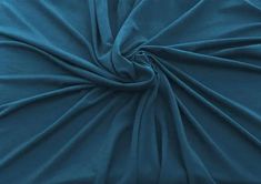 a close up view of a blue fabric