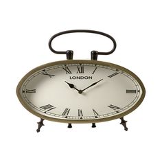 an old fashioned clock with roman numerals on it's face and hands