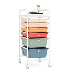 a white cart with four different colored drawers