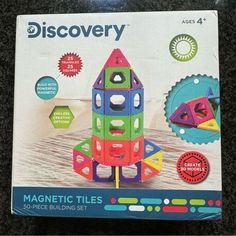 the box is full of magnetic tiles for kids