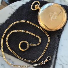 Antique Solid 14k Yellow Gold Pocket Watch with 19" 14k Watch Chain SPECTACULAR!! Amazing Old Gold 14k 585 Pocket Watch!! Comes on a 14k yellow gold watch chain. I don't believe chain is from the 1920's, I believe it was added later on with second owner (1980's) Watch case measures approximately 50mm across. Chain is just under 19" end to end. Total weight with chain 87.2 grams! I am not sure of the exact year of this watch, two different dates engraved inside front cover oldest date 1928 approx Gold Pocket Watch, Pocket Watches, Watch Chain, Watch Case, Gold Watch, Pocket Watch, Dates, Yellow Gold, Chain