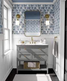 a bathroom with two sinks and a large mirror on the wall next to a window