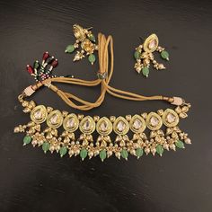 Mint Kundan Choker Set/With Meenakari Work On It/ Indian Kundan Choker/Indian Wedding Necklace It’s A Really Light Weighted Tight Or Loose Tutu Wear A Necklace Around The Neck Mint Color With The Mint Meenakari Work It’s The Latest Design Reasonable Offer Acceptable Bundle It To Save It More Designer Gold Kundan Necklace, Designer Kundan Gold Necklace, Designer Kundan Gold Necklaces, Designer Gold Kundan Necklace For Festive Occasions, Festive Designer Gold Kundan Necklace, Designer Gold Kundan Necklace For Wedding, Elegant Green Necklace With Zari Work, Designer Gold Kundan Necklace For Gift, White Meenakari Fusion Necklaces