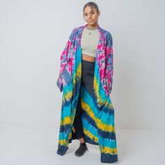 Zinnia Pearl Complete your look with this gorgeous tiedye kimono featured in a shapeless, flowy silhouette and open front style with an eye-catching allover hand tiedye design, wide, dropped sleeves. Size: One plus size Color: multicolor  Finish: super soft, Comfortable, matte, drape well Weight: medium Measurements:  bust 64 in (relaxed) Waist 72 in Sleeve Length: 29 in Length: 55 in Armholes width 12.5 in Fabrics: 100% cotton - high quality knit jersey fabric - light stretch Details: Open fron Spring Tie Dye Kimono With Kimono Sleeves, Tie Dye Kimono For Festivals, Tie-dye Kimono With Kimono Sleeves For Festivals, Festival Tie-dye Kimono With Kimono Sleeves, Spring Festival Tie Dye Kimono, Festival Tie-dye Kimono, Spring Tie Dye Kimono For Beach Cover-up, Spring Festival Tie Dye Cover-up, Spring Festival Tie-dye Cover-up