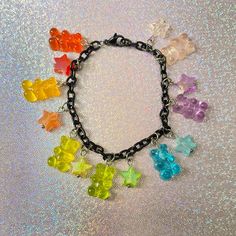 Fulfill your inner sweet side with this rainbow gummy bear charm bracelet! #gummybearbracelet #gummybearjewelry #decorakei #rainbowcore #decorakeijewelry #cutejewelry #cutebracelet #handmadejewelry #jewelryshop #etsyjewelry Colorful Playful Dangle Earrings, Colorful Playful Dangle Jewelry, Playful Colorful Dangle Jewelry, Kawaii Bracelet Jewelry For Friendship, Kawaii Friendship Bracelet Jewelry, Cute Multicolor Dangle Jewelry, Fun Rainbow Hypoallergenic Jewelry, Cute Dangle Charm Bracelet, Cute Multicolor Charms Bracelets