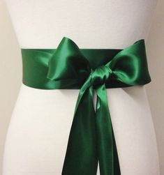 EMERALD GREEN 5cm (2") Wide Double Sided Satin Ribbon Sash    This plain coloured ribbon sash is perfect for matching or adding colour to your bridal/bridesmaid/flower girl attires. It can also be used to colour coordinate with your wedding theme.  This listing is for one (1) 5cm (2") wide Emerald Green sash as pictured.   Different colours are available from the link below. https://www.etsy.com/au/shop/RoseybloomBoutique?section_id=28650939&sort_order=price_asc Smaller width is also available from the link below. https://www.etsy.com/au/shop/RoseybloomBoutique?section_id=28635850&sort_order=price_asc The ends of the sash are angle cut and heat sealed to prevent fraying. The bow tied on this sash is not premade, you will need to tie it yourself.  This sash is available in two women clothin Green Aesthetic Board, Outdoor Woodsy Wedding, Bard Aesthetic, Tying Bows, Long Purple Hair, Hair Fancy, Irish Dance Costume, Wedding Collage, Custom Sash