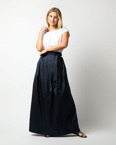 A chic, party-ready wrap skirt that also looks pretty great dressed down for daytime. This one is made of a rich silk shantung from India. It's got an adjustable waist tie that gives you a fantastic, cinched-in shape… we recommend a girly bow, or a big karate-belt knot with the ends hanging loose. It sits high on the waist with a full skirt that gives you plenty of room to move. Belt Knots, Karate Belt, Clothing Catalog, Hang Loose, Buckle Shoes, Sweater Gift, Full Skirt, Dressed Down, Wrap Skirt