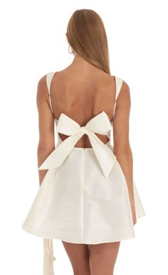 Foxie Fit and Flare Dress in Ivory | LUCY IN THE SKY White Bow Tie Back Evening Dress, White Evening Dress With Bow Tie Back, A-line Mini Dress With Bow For Wedding, White Evening Dresses With Satin Bow, Cream Party Dress With Bow, Wedding A-line Mini Dress With Tie Back, White Dresses With Satin Bow For Spring, White Satin Bow Dress For Spring, White Spring Dresses With Satin Bow