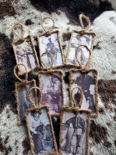 some pictures hanging from twine with rope