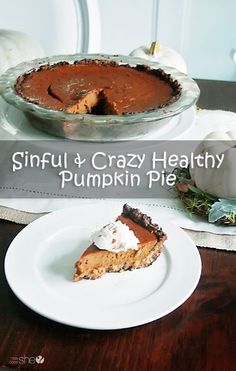 a slice of pumpkin pie sitting on top of a white plate