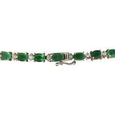 Stamped: 14KTotal Necklace Weight: 28 GramsNecklace Length: 18 InchesCenter Emerald Weight: 3.38 Carat (11.00x9.00 Millimeters)Side Emerald weight: 22.60 Carat (6.00x4.00 Millimeters)Diamond Weight: 3.98 Carat (F-G Color, VS2-SI1 Clarity) Face Measures: 21.70x21.85 MillimetersSKU: [600840] Formal Emerald Necklace With Brilliant Cut, Formal White Gold Emerald Necklace, Elegant Emerald Necklace With Prong Setting For Formal Occasions, Elegant Formal Emerald Necklace With Prong Setting, Classic Emerald Necklace With Prong Setting, Classic Formal Emerald Necklace With Hallmark, Elegant Oval Emerald Necklace For Formal Occasions, Classic Formal Emerald Necklace Hallmarked, Classic Formal Hallmarked Emerald Necklace