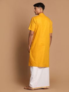 VASTRAMAY Men's Mustard Cotton Kurta And Mundu Set Add a touch of tradition to your wardrobe with this mustard cotton kurta and mundu set from VASTRAMAY. Perfect for special occasions or festive events, this set offers comfort and style. The kurta features a classic design with intricate detailing, while the mundu adds an elegant touch. Made from high-quality cotton, this set is easy to maintain and durable, ensuring long-lasting wear. Features: Mustard cotton kurta with intricate detailing Come Yellow Cotton Silk Kurta For Festivals, Yellow Cotton Silk Kurta With Pallu, Cotton Silk Kurta For Puja During Transitional Season, Transitional Cotton Silk Kurta For Puja, Cotton Kurta With Pallu For Diwali, Diwali Cotton Kurta With Pallu, Traditional Mustard Cotton Kurta, Yellow Cotton Traditional Wear For Eid, Cotton Short Sleeve Sets For Eid