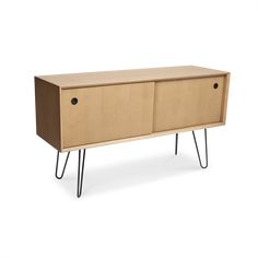 the sideboard is made from wood and metal legs