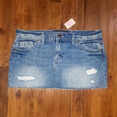 -Brand: Pink Victoria’s Secret -Type: Distressed Cut Off Denim Jean Skirt -Color: Medium Blue Wash -Size: Women’s 2 -Waist Measurement: 15 1/2” -100% Cotton -Comes From A Smoke Free Home. -Condition: New With Tags Please Check Out The Other Pink And Victoria’s Secret Items I Have For Sale. Fitted Distressed Medium Wash Mini Skirt, Medium Wash Ripped Mid-rise Skirt, Ripped Medium Wash Mini Skirt, Ripped Cutoff Medium Wash Mini Skirt, Distressed Cutoff Denim Skirt In Medium Wash, Medium Wash Distressed Cutoff Denim Skirt, Distressed Denim Mid-rise Mini Skirt, Light Wash Distressed Mini Skirt, Mid-rise Distressed Denim Mini Skirt