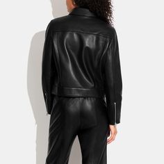 100% lamb leather Lining: 58% polyester 42% viscose Zip closure Slip pockets Length: 19 1/2 Model is 5'10 (178cm) chest 31 (79cm) waist 24 (61cm) hips 35 (89cm) and wears a size S Style No. CG669 Leather Jacket With Zipper Closure For Work, Sleek Leather Jacket With Pockets For Work, Fall Biker Jacket With Lapel Collar And Pockets, Sleek Leather Jacket For Work With Pockets, Winter Leather Jacket With Long Sleeves For Work, Fall Workwear Collared Biker Jacket, Long Sleeve Biker Jacket For Fall Workwear, Fitted Collared Biker Jacket For Fall, Winter Workwear Leather Jacket With Pockets