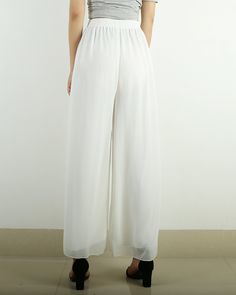 * A wide leg pants with elastic waist, made with beautiful pearl chiffon pants, very comfortable to wear, not easy to get wrinkled, very easy to take care of. * Material: outer-pearl chiffon, lining-100% polyester Custom made to fit, lead time is 6-8 days; Let us know your usual size in your country and your overall height. If you have some specific request or special characters such as broad shoulder, long arms, long waist, etc you think we need pay attention to when making, do let me know. * C Casual Solid Chiffon Bottoms, Casual Chiffon Bottoms For Party, Elegant Summer Pants With Elastic Waistband, Flowy Summer Pants With Elastic Waistband, Casual Chiffon Party Bottoms, Flowy Chiffon Party Bottoms, Casual Chiffon Bottoms With Elastic Waistband, Solid Chiffon Bottoms For Party, Casual High Waist Chiffon Bottoms