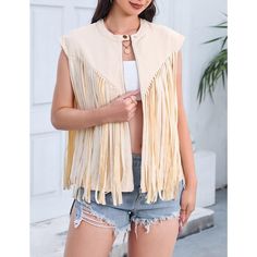 Get a retro vibe in our women's fringe undershirt. Crafted from faux suede, this sleeveless tunic exudes the vibe of 70's hippie wear. Accented with fringe detailing, this undershirt is the perfect statement piece for hippie style. Spring Cotton Vest With Frayed Hem, Summer Bohemian Outerwear With Frayed Hem, Summer Festival Sleeveless Outerwear, Trendy Summer Outerwear With Fringe, Sleeveless Outerwear For Summer Festivals, Sleeveless Festival Outerwear, Spring Fringe Tops, Chic Fringe Tops For Fall, Trendy Summer Fringe Outerwear