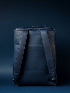 [[globalsection(6)]] Design Statement Details Shipping & Returns Winner of the Good Design Award The Hybrid Briefcase Backpack, designed by Colombian designer Juan Andrés Quiñones, addresses the multifaceted needs of the contemporary urban professional. The 3-in-1 design integrates backpack ergonomics for comfortable commutes, briefcase formality for professional settings, and messenger accessibility for urban navigation, all within a refined and subdued aesthetic. Cleverly concealed elements fa Modern Laptop Bag With Luggage Sleeve For School, Modern Rectangular Cases For School, Modern School Backpack With Luggage Sleeve, Rectangular Blue Backpack For Commuting, Blue Rectangular Backpack For Commuting, Rectangular Laptop Bag For Commuting, Modern Laptop Bag Standard Backpack For School, Luxury Commuting Bag With Luggage Sleeve, Modern Commuting Backpack Luggage