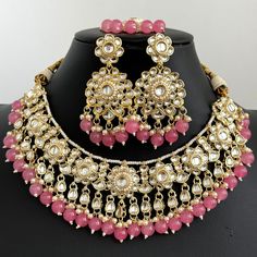 Pink Pearl Kundan Necklace, Kundan jewelry, Indian Jewelry , Wedding Jewelry, Pakistani Jewelry, Indian wedding , Bridesmaid Jewelry Regular size and adjustable with a golden thread  This is 100% Handmade jewelry. So Color, shades, texture displayed may slightly vary from the actual product due to digital image limitations. We request you to consider these minor variations. Please expect the possibility of some slight imperfections when buying handmade jewelry. If you have any questions, please Jewelry Indian Wedding, Jewelry Pakistani, Golden Thread, Wedding Bridesmaid Jewelry, Kundan Jewelry, Pakistani Jewelry, Kundan Necklace, Kundan Necklaces, Jewelry Indian