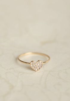 Pavé Diamond Baby Heart Ring $495.00 Valentine's Day Promise Jewelry With Single Diamond, Heart Ring With Single Diamond For Promise, Heart-shaped Single Diamond Jewelry For Promise, Dainty Heart-shaped Rose Gold Diamond Ring, Dainty Rose Gold Heart-shaped Diamond Ring, Dainty Rose Gold Heart Diamond Ring, Promise Heart Ring With Single Diamond, Heart-shaped Single Diamond Promise Ring, Dainty White Gold Diamond Heart Ring