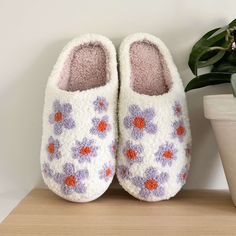 Cozy and Fluffy Slip-On Step into a world of pure comfort with our cozy and fluffy Purple Flowers Slip-on Slippers! These slip-on slippers give your feet a soft, cushiony embrace. Perfect for those cozy moments at home, they are your go-to for unbeatable warmth and comfort. Non-slip Sole For Safety and Style Enjoy the perfect blend of safety and style as you stroll through your home! These flower slippers come with a non-slip sole that grips various surfaces with ease, giving you confidence and stability with every step. Chic Floral Design These fashionable slippers feature a vibrant purple flower design, blending comfort with style effortlessly. Not only are they a cozy accessory, but they also add a touch of flair to your loungewear. Product Details Pattern: FlowersType: Slip-onSeason: A Flower Slippers, Chill Time, Cozy Slippers, Reindeer Headband, Cozy Accessories, Matisse Prints, Plush Slippers, Cozy Moments, Slippers Cozy