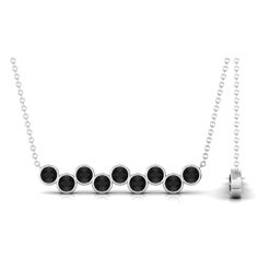 Product Details Make a statement at any party or special occasion with this elegant and chic Black Onyx Necklace. The necklace features Round Cut Black Onyx stones in a Bezel Setting, arranged in a stunning Nine Stone Bar Necklace design. Crafted from high-quality Gold, this necklace is sure to elevate any outfit with its sophisticated style. Product Information SKU SHP-PENDANT042159316 Length 5.8 mm Width 32 mm Weight 3.76 gm (Approximate) BLACK ONYX INFORMATION No.of Stones 9 Pieces Total Weight 0.81 Carat (Approximate) Dimension(approx) Round-3X3 mm-9 Pcs Color Black Cut Brilliant Shape Round Setting Type Bezel-Setting Quality Grade AAA View More Product Parent Collection Handle black-onyx-necklaces Modern Black Necklace For Evening, Formal Black Necklace With Black Diamonds, Formal Black Necklaces With Black Diamonds, Modern Black Necklace For Party, Modern Black Necklaces For Parties, Elegant Party Jewelry With Bezel Setting, Onyx Bar, Cleaning Stone, Stone Bar