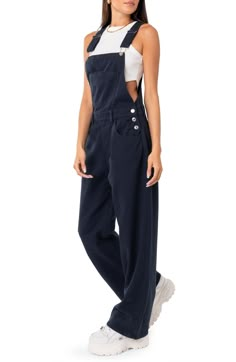 Whether you're an experienced boarder or just love the skater aesthetic, these denim overalls with kicky wide legs are brimming with laid-back style. Square neck Adjustable buckle straps 100% cotton Machine wash, dry flat Imported Cotton On Overalls, Overalls Outfit Inspiration, Baggy Overalls Outfit, 90s Overalls Outfit, Clothes Ideas For School, Megan Moroney Concert, Overalls Flare, Flare Outfit, Aesthetic Overalls