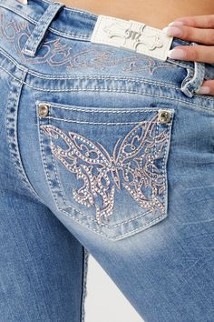 - Low-rise, light-wash slim bootcut jeans- Butterfly design in pink and silver embroidery with matching yoke design- Mini silver rhinestone rivets throughout design- White leather logo brand patch- Rhinestone rivets- 5-pocket design- Slight fading- 52% Cotton 27% Lyocell 20% Polyester 1% Elastane- Gentle machine wash inside-out with like colors in cold water, Tumble dry low Model is wearing size: 26Model Measurements: Height: 5'8" Bust: 35" Waist: 26" Hips: 39" Style No. L9330SB-L289 Luxury Medium Wash Flare Jeans With Patch Pockets, Luxury Washed Blue Flare Jeans With Five Pockets, Cute Ripped Boot Cut Jeans, Luxury Faded Flare Jeans With Pockets, Luxury Faded Denim Flare Jeans, Luxury Medium Wash Flare Jeans For Summer, Lowrise Rhinestone Jeans, Cheap Fitted Light Wash Flare Jeans, Luxury Fitted Denim Blue Flare Jeans