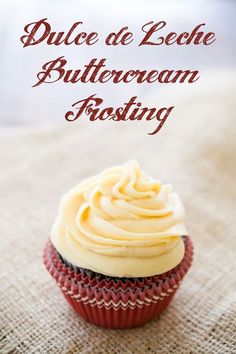 a close up of a cupcake with frosting on it and the words dulce de leche buttercream frosting