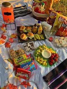 a table with snacks and candy on it