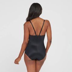 This versatile bodysuit is the ultimate solution for low-back dresses! The flawless-finish fabric is lightweight, cling-free, and offers 360 degrees of comfortable, single-layer shaping for a sleek, all-over feel. And, best of all? The innovative design features lightly padded, fit-flexible wireless cups and adjustable, convertible straps for a variety of styling options Stretch Backless Bodysuit With Built-in Bra, Sleek Second-skin Bodysuit With Low Back, Second-skin Bodysuit With Built-in Bra And Low Back, Sleek Second-skin Shapewear With Built-in Bra, Supportive Swimwear With Built-in Bra, Second-skin Smoothing Bodysuit For Swimming, Smoothing Second-skin Bodysuit For Swimming, Sleek Bodysuit With Low Back And Moderate Coverage, Stretch Low Back Bodysuit Bra Friendly