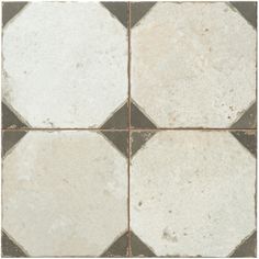 a white and grey tile floor with squares on it's sides, in different sizes