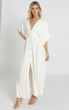 Sitting Pretty Dress In Natural | Showpo Casual White Maxi Dress With Button Closure, White Button-up Maxi Dress For Vacation, V-neck Midi Dress With Button Closure For Vacation, Flowy Spring Maxi Dress With Button Closure, Summer Button-up Maxi Dress, Chic Beach Maxi Dress With Button-up, Chic Button-up Maxi Dress For Beach, Flowy Maxi Dress With Buttons For Brunch, White Button-up Maxi Dress For Summer