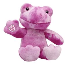 a pink teddy bear with hearts on it's chest