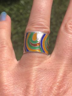 Vintage enamel rainbow thick band ring Mexico size 5.5. Beautiful vibrant colors! Adjustable Multicolor Enamel Rings, Multicolor Enamel Open Ring, Adjustable Multicolor Enamel Round Ring, Unique Multicolor Enamel Ring, Multicolor Retro Rings For Gifts, Multicolor Retro Rings For Gift, Retro Multicolor Rings For Gift, Handmade Multicolor Enamel Ring, Unique Handmade Multicolor Enamel Ring